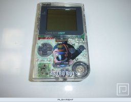 Game Boy Light [Astro Boy Osamu World Shop Limited Edition]   © Nintendo 1998   (GB)    2/3